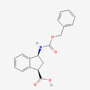 molecular formula C18H17NO4 B13515946 rac-(1R,3S)-3-{[(benzyloxy)carbonyl]amino}-2,3-dihydro-1H-indene-1-carboxylic acid 