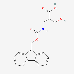 molecular formula C19H19NO5 B13521533 2-[({[(9H-fluoren-9-yl)methoxy]carbonyl}amino)methyl]-3-hydroxypropanoic acid 