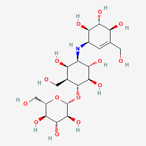 molecular formula C20H35NO14 B1352391 (2S,3R,4R,5S,6S)-2-(hydroxymethyl)-6-[(1R,2R,3S,4R,5R,6S)-2,3,5-trihydroxy-6-(hydroxymethyl)-4-[[(1R,4S,5R,6R)-4,5,6-trihydroxy-3-(hydroxymethyl)cyclohex-2-en-1-yl]amino]cyclohexyl]oxyoxane-3,4,5-triol CAS No. 102583-47-1