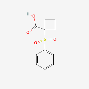 molecular formula C11H12O4S B13524268 1-(benzenesulfonyl)cyclobutane-1-carboxylic Acid 