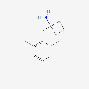 1-(2,4,6-Trimethylbenzyl)cyclobutan-1-amine