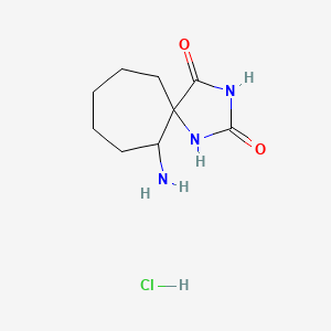 molecular formula C9H16ClN3O2 B13525519 6-Amino-1,3-diazaspiro[4.6]undecane-2,4-dionehydrochloride 