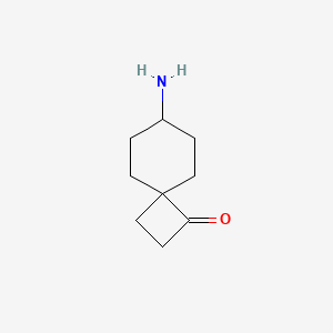 molecular formula C9H15NO B13526193 7-Aminospiro[3.5]nonan-1-one 