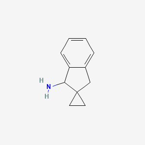 molecular formula C11H13N B13526297 1',3'-Dihydrospiro[cyclopropane-1,2'-indene]-3'-amine 