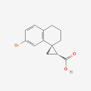 rac-(1R,3R)-7'-bromo-3',4'-dihydro-2'H-spiro[cyclopropane-1,1'-naphthalene]-3-carboxylic acid