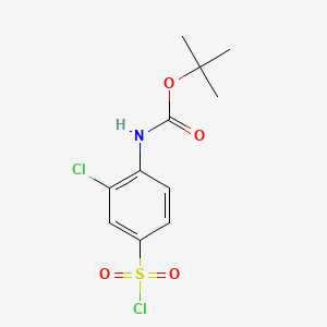 molecular formula C11H13Cl2NO4S B13528228 tert-Butyl (2-chloro-4-(chlorosulfonyl)phenyl)carbamate 