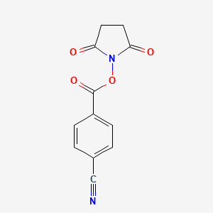 molecular formula C12H8N2O4 B1353566 苯甲腈，4-[[(2,5-二氧代-1-吡咯烷基)氧羰基]- CAS No. 99300-38-6