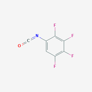 molecular formula C7HF4NO B13540186 1,2,3,4-Tetrafluoro-5-isocyanatobenzene 