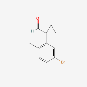 molecular formula C11H11BrO B13556023 1-(5-Bromo-2-methylphenyl)cyclopropane-1-carbaldehyde 