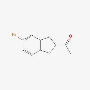 molecular formula C11H11BrO B13556439 1-(5-bromo-2,3-dihydro-1H-inden-2-yl)ethan-1-one 