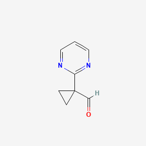 1-(2-Pyrimidinyl)cyclopropanecarboxaldehyde