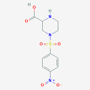 4-(4-Nitrophenyl)sulfonyl-piperazine-2-carboxylic acid