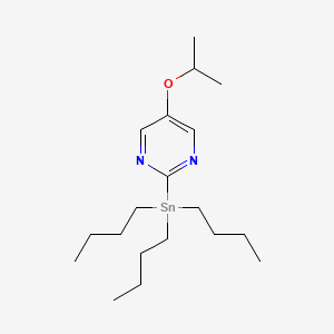 molecular formula C19H36N2OSn B13560246 5-Isopropoxy-2-(tributylstannyl)pyrimidine 