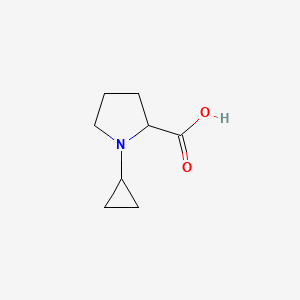 molecular formula C8H13NO2 B13562240 1-Cyclopropylpyrrolidine-2-carboxylic acid 