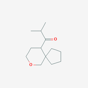 molecular formula C13H22O2 B13562448 2-Methyl-1-{7-oxaspiro[4.5]decan-10-yl}propan-1-one 