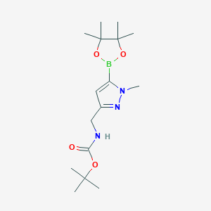 molecular formula C16H28BN3O4 B13566471 tert-Butyl N-{[1-methyl-5-(tetramethyl-1,3,2-dioxaborolan-2-yl)-1H-pyrazol-3-yl]methyl}carbamate 