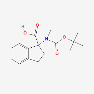 molecular formula C16H21NO4 B13566488 1-{[(tert-butoxy)carbonyl](methyl)amino}-2,3-dihydro-1H-indene-1-carboxylicacid 