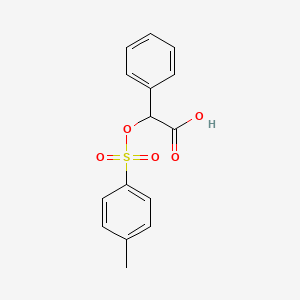 molecular formula C15H14O5S B13571501 2-[(4-Methylbenzenesulfonyl)oxy]-2-phenylacetic acid 