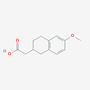 molecular formula C13H16O3 B1358139 (6-Methoxy-1,2,3,4-tetrahydro-naphthalen-2-yl)-acetic acid CAS No. 57351-00-5