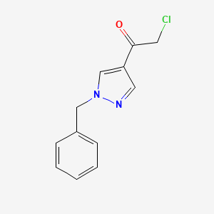 molecular formula C12H11ClN2O B13588521 1-(1-benzyl-1H-pyrazol-4-yl)-2-chloroethan-1-one 