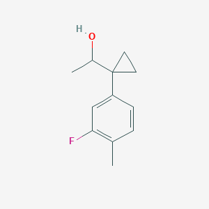 molecular formula C12H15FO B13596164 1-[1-(3-Fluoro-4-methylphenyl)cyclopropyl]ethan-1-ol 