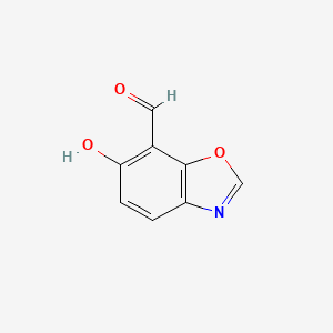 molecular formula C8H5NO3 B13600107 6-hydroxy-7-Benzoxazolecarboxaldehyde 