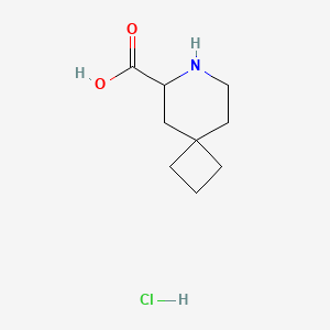 molecular formula C9H16ClNO2 B13603704 7-Azaspiro[3.5]nonane-6-carboxylicacidhydrochloride 