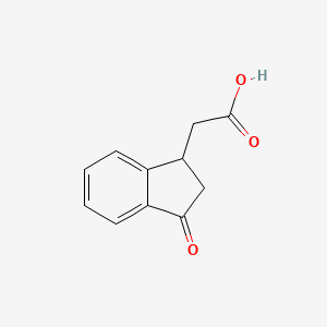 2-(3-Oxo-2,3-dihydro-1H-inden-1-YL)acetic acid