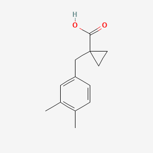 molecular formula C13H16O2 B13604517 1-(3,4-Dimethylbenzyl)cyclopropane-1-carboxylic acid 