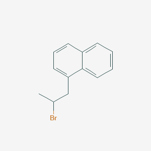 molecular formula C13H13Br B13605080 1-(2-Bromopropyl)naphthalene 