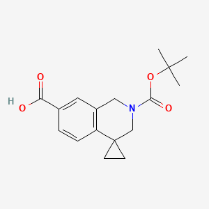 2'-[(tert-butoxy)carbonyl]-2',3'-dihydro-1'H-spiro[cyclopropane-1,4'-isoquinoline]-7'-carboxylicacid