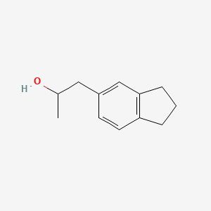 molecular formula C12H16O B13608068 1-(2,3-dihydro-1H-inden-5-yl)propan-2-ol 