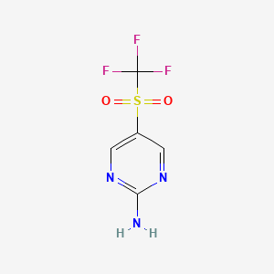 molecular formula C5H4F3N3O2S B13608328 5-Trifluoromethanesulfonylpyrimidin-2-amine 