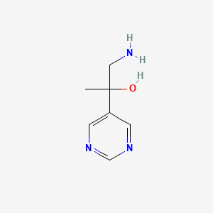 molecular formula C7H11N3O B13612213 1-Amino-2-(pyrimidin-5-yl)propan-2-ol 