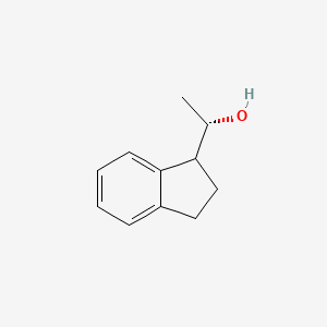 molecular formula C11H14O B13613120 (1S)-1-(2,3-dihydro-1H-inden-1-yl)ethan-1-ol 