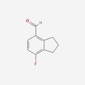 7-fluoro-2,3-dihydro-1H-indene-4-carbaldehyde