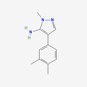 molecular formula C12H15N3 B13623315 4-(3,4-Dimethylphenyl)-1-methyl-1h-pyrazol-5-amine 