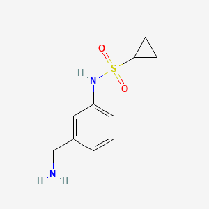 molecular formula C10H14N2O2S B13626104 N-[3-(aminomethyl)phenyl]cyclopropanesulfonamide 