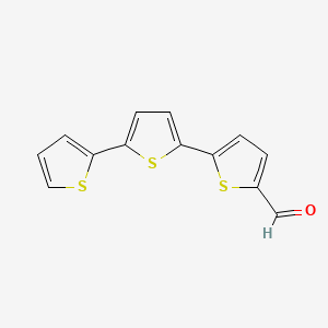 molecular formula C13H8OS3 B1362741 5-[5-(2-Thienyl)-2-thienyl]thiophene-2-carbaldehyde CAS No. 7342-41-8