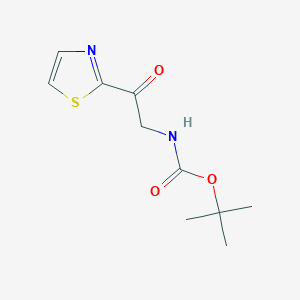 molecular formula C10H14N2O3S B13629531 Tert-butyl 2-oxo-2-(thiazol-2-yl)ethylcarbamate 