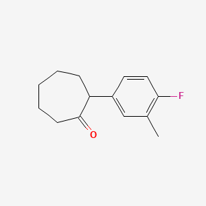 2-(4-Fluoro-3-methylphenyl)cycloheptan-1-one