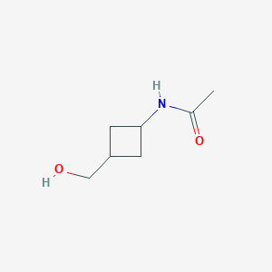 molecular formula C7H13NO2 B13632450 N-((1S,3s)-3-(hydroxymethyl)cyclobutyl)acetamide 