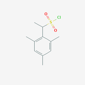 molecular formula C11H15ClO2S B13633057 1-Mesitylethane-1-sulfonyl chloride 