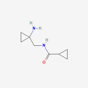 molecular formula C8H14N2O B13634315 N-[(1-aminocyclopropyl)methyl]cyclopropanecarboxamide 