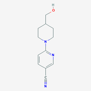 molecular formula C12H15N3O B13635385 6-[4-(Hydroxymethyl)piperidin-1-yl]pyridine-3-carbonitrile 