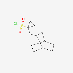 molecular formula C12H19ClO2S B13639769 1-(Bicyclo[2.2.2]octan-2-ylmethyl)cyclopropane-1-sulfonyl chloride 