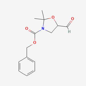 molecular formula C14H17NO4 B13641625 Benzyl 5-formyl-2,2-dimethyl-1,3-oxazolidine-3-carboxylate 