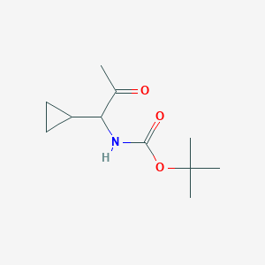 tert-butyl N-(1-cyclopropyl-2-oxopropyl)carbamate