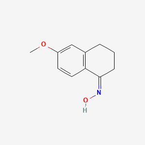 (E)-6-methoxy-3,4-dihydronaphthalen-1(2H)-one oxime