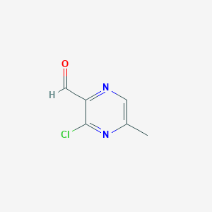 molecular formula C6H5ClN2O B13665374 3-Chloro-5-methylpyrazine-2-carbaldehyde 